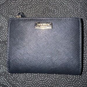 Lightly used almost new Kate Spade snap wallet with coin pouch